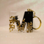 resin keychain in the form of letters